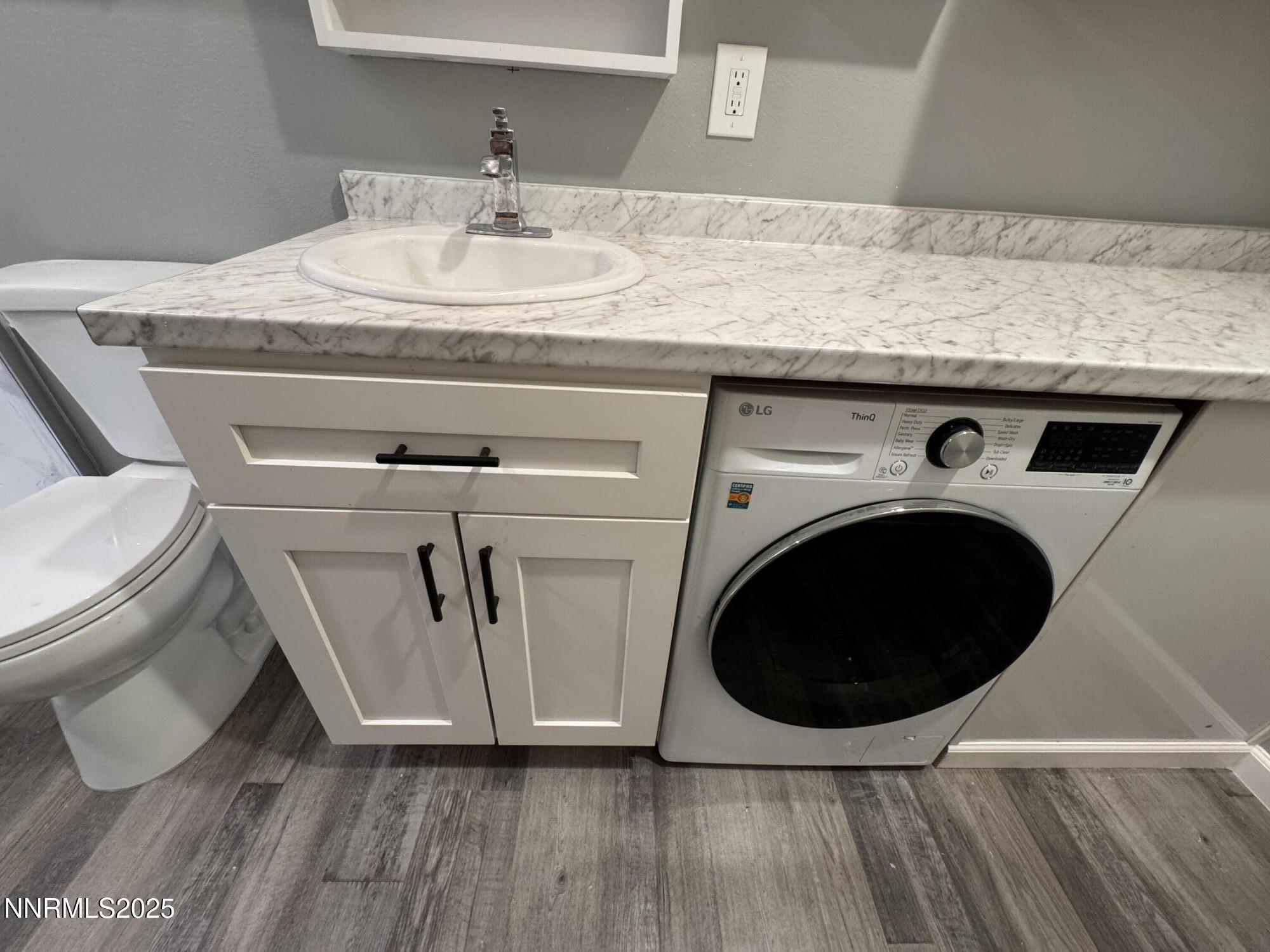1360 North Sierra Street Reno, NV 89503 - Photo 9 of 9 a utility room with dryer and washer