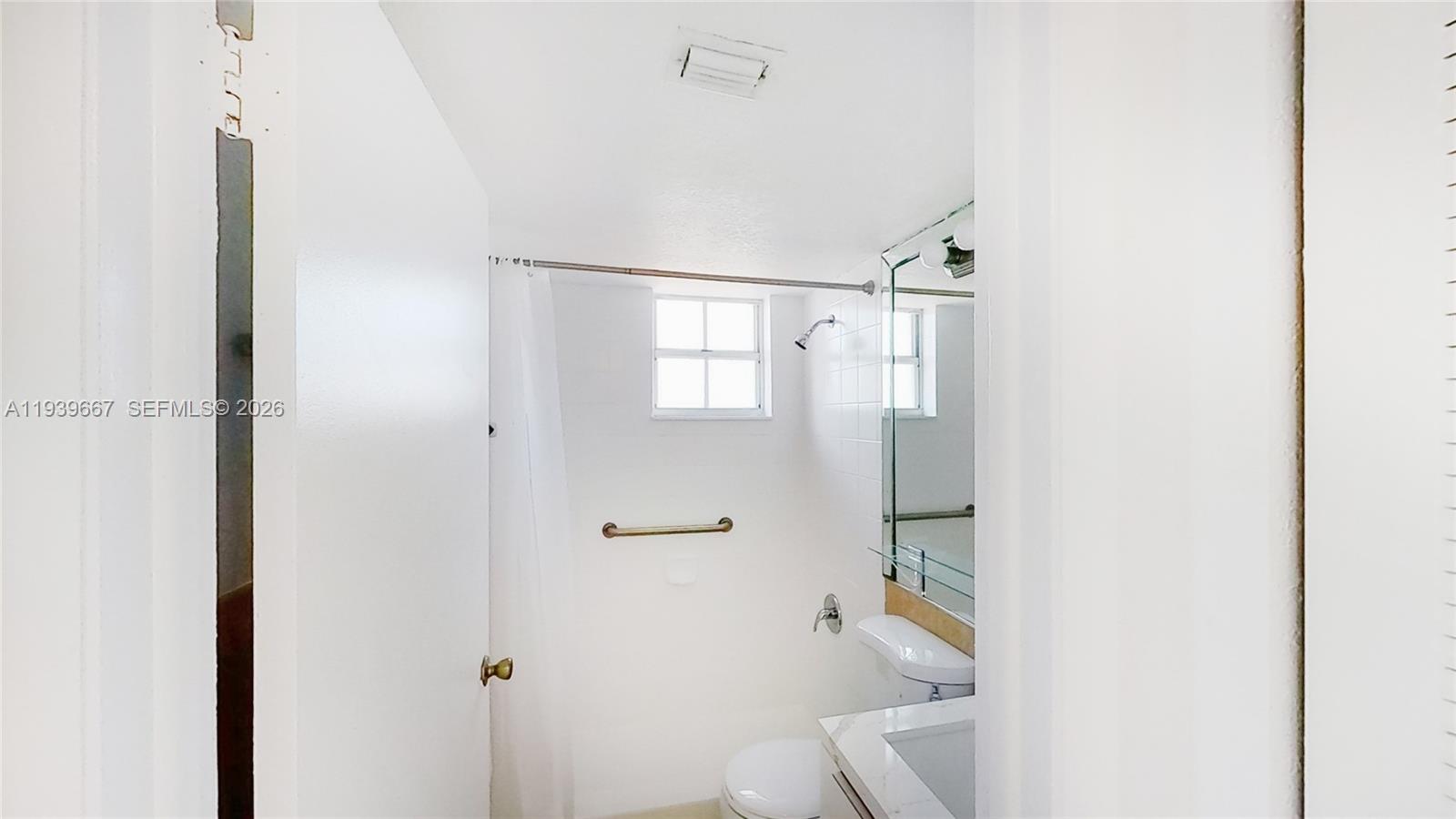 199 Southwest 12th Avenue, Unit 313E Miami, FL 33130 - Photo 10 of 21 a bathroom with a bathtub and a shower