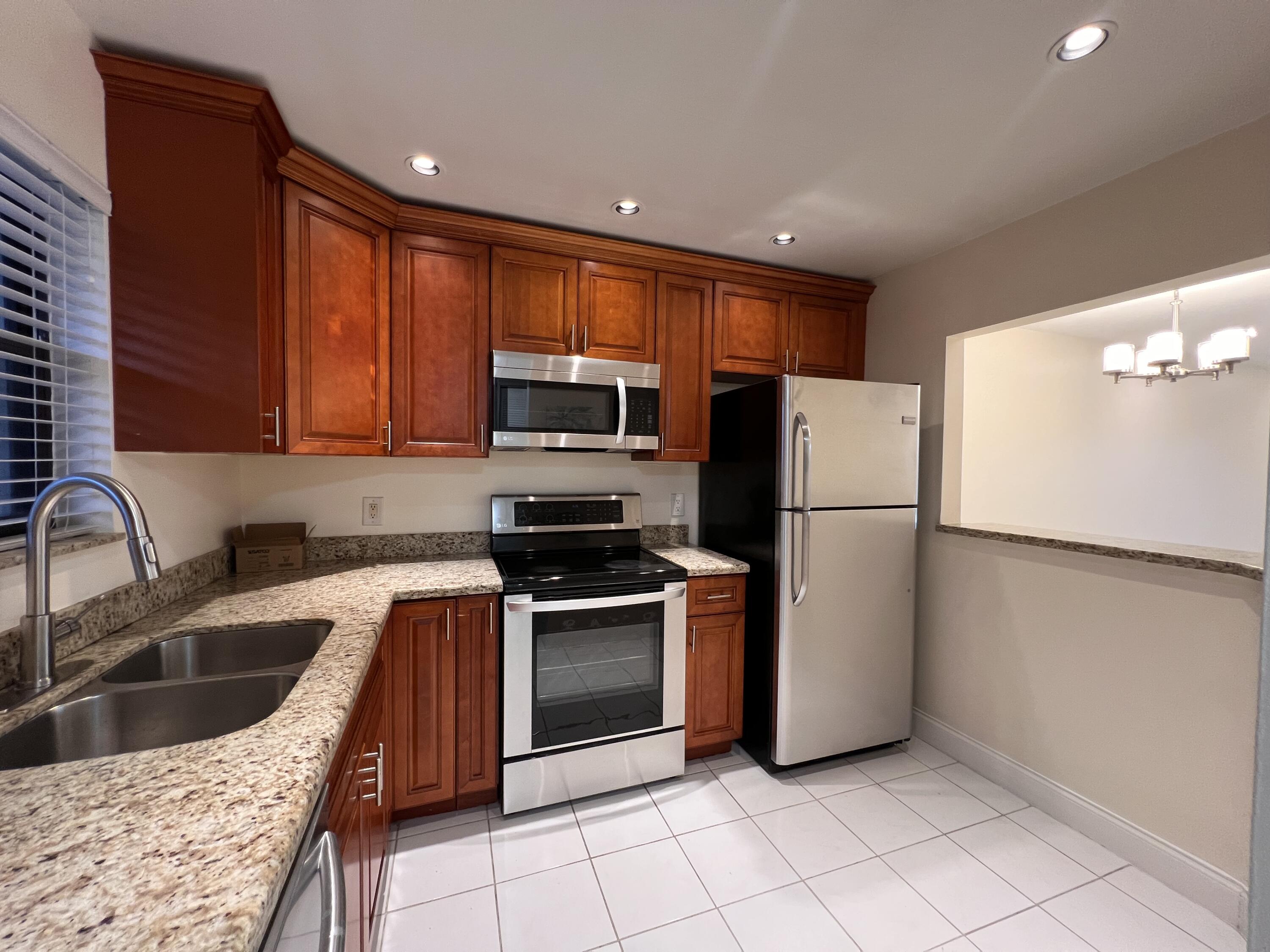 21911 Lake Forest Circle, Unit 206 Boca Raton, FL 33433 - Photo 2 of 28 IMG_4976