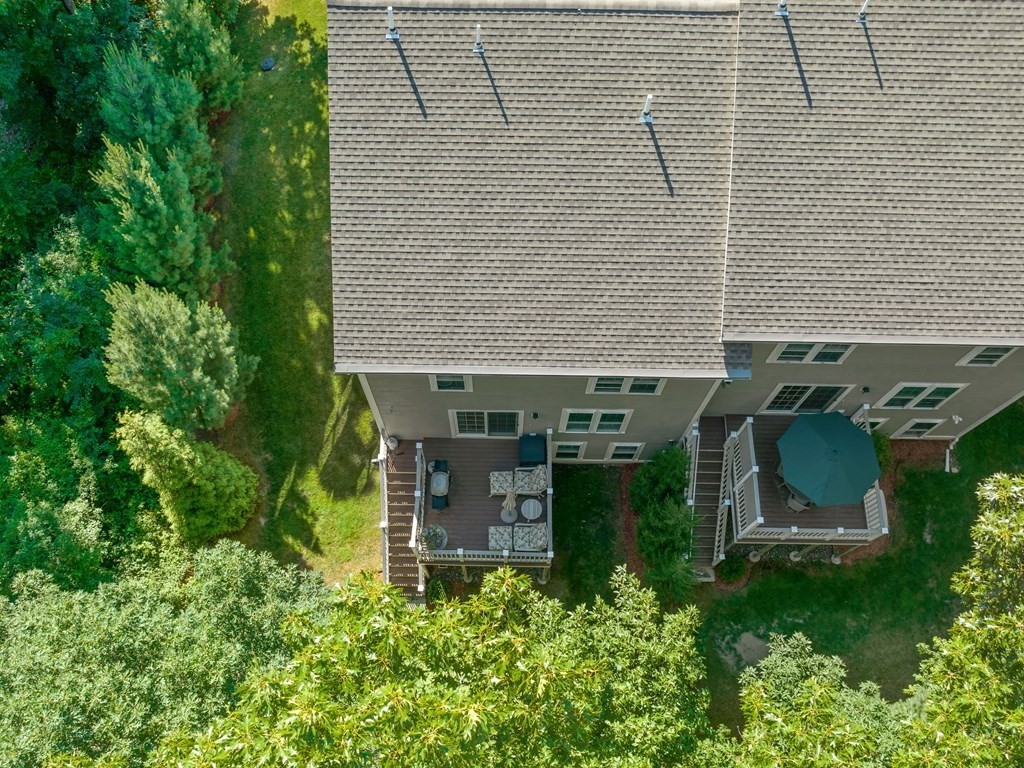 6 Robinson Road, Unit 3 Lexington, MA 02420 - Photo 33 of 38 aerial view of a house with backyard and sitting area