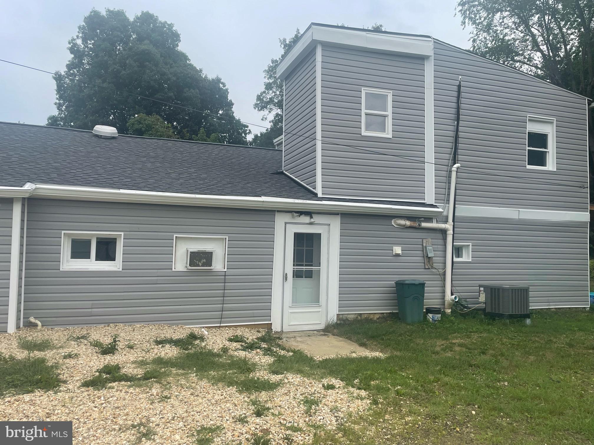 5455 Mason Springs Road, Unit D Indian Head, MD 20640 - Photo 7 of 9 a view of a house with a yard