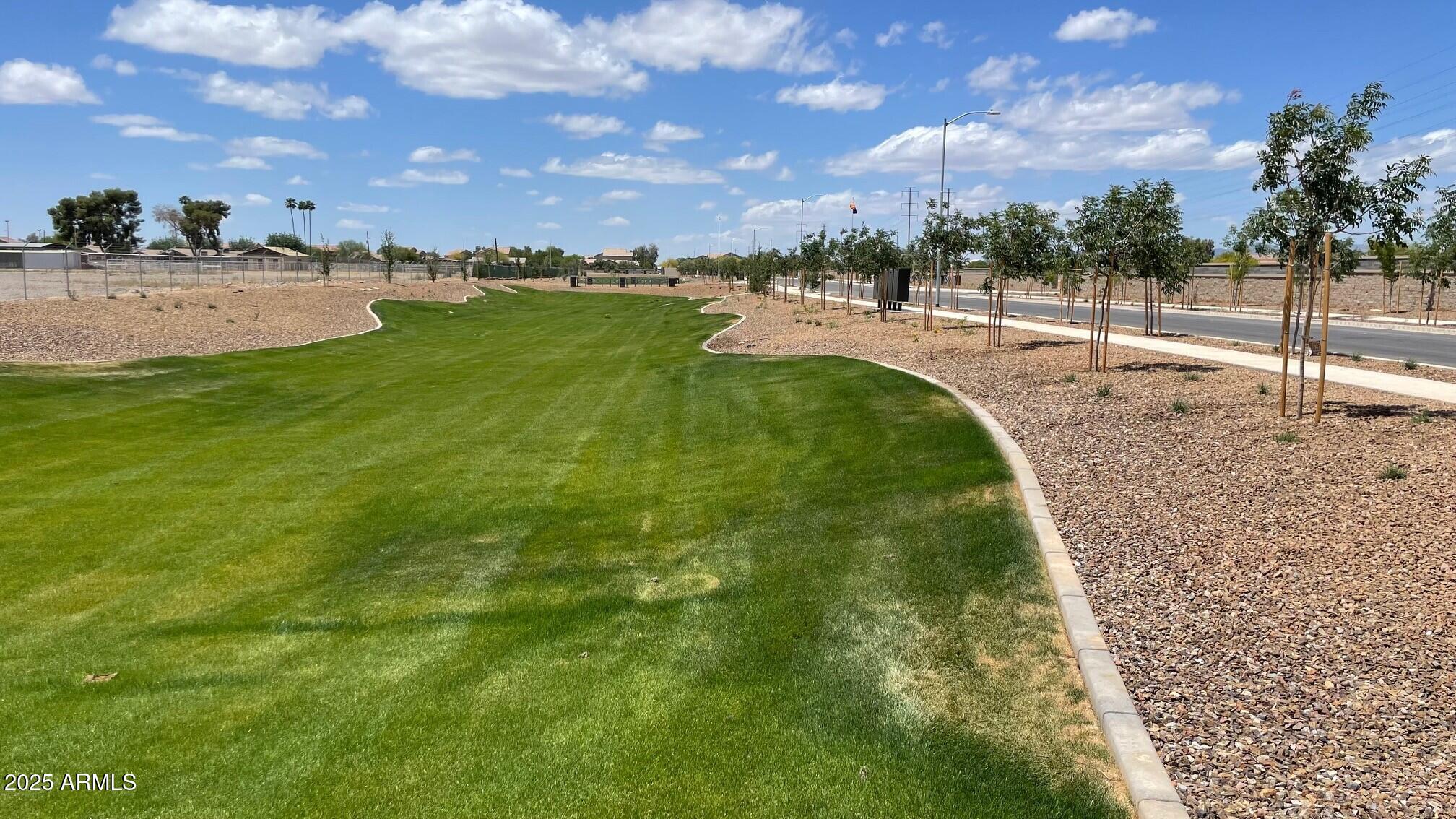 9843 West Albeniz Place Tolleson, AZ 85353 - Photo 3 of 18 a view of outdoor space and yard