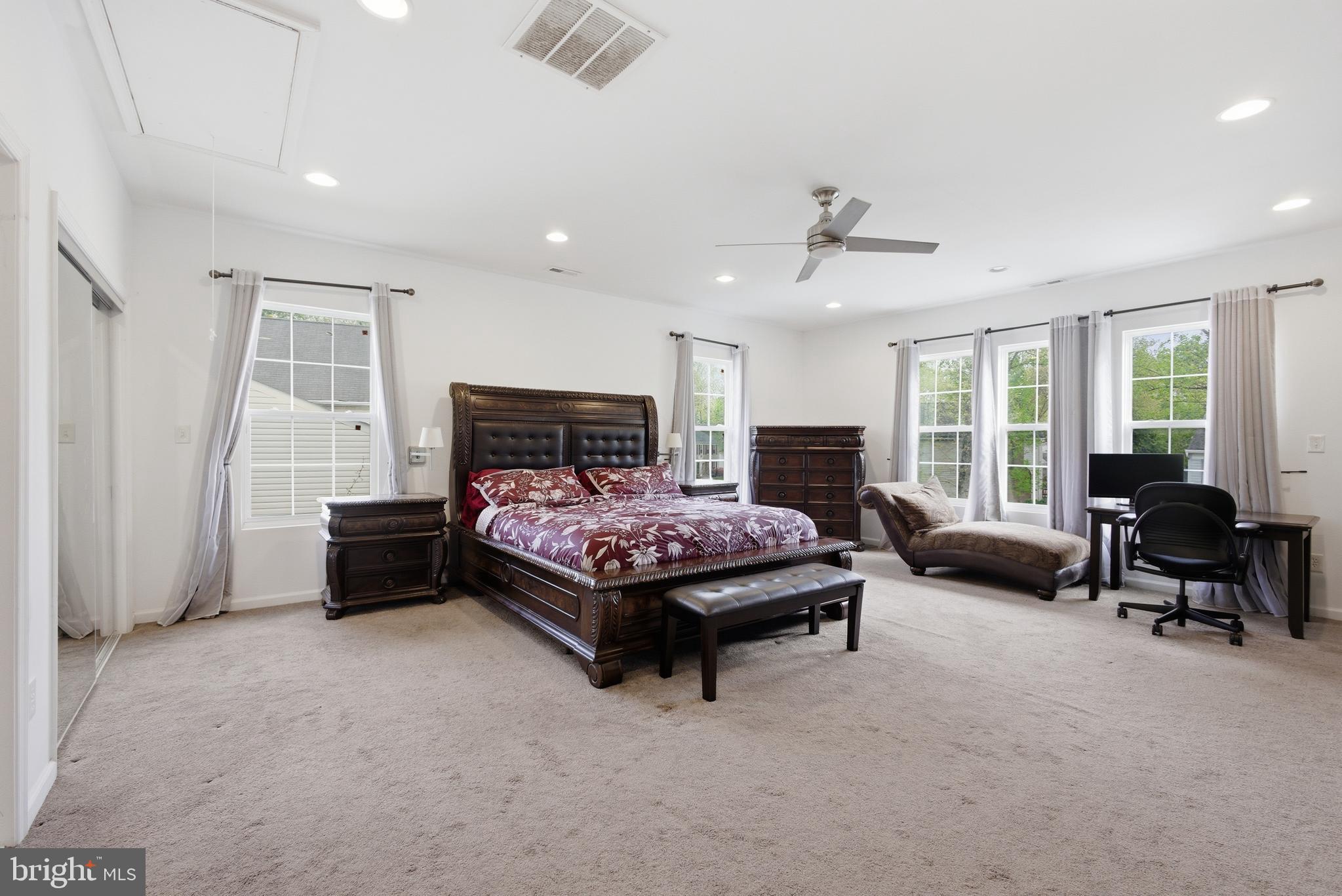 8664 Pohick Forest Court Springfield, VA 22153 - Photo 20 of 41 a bedroom with furniture and a couch