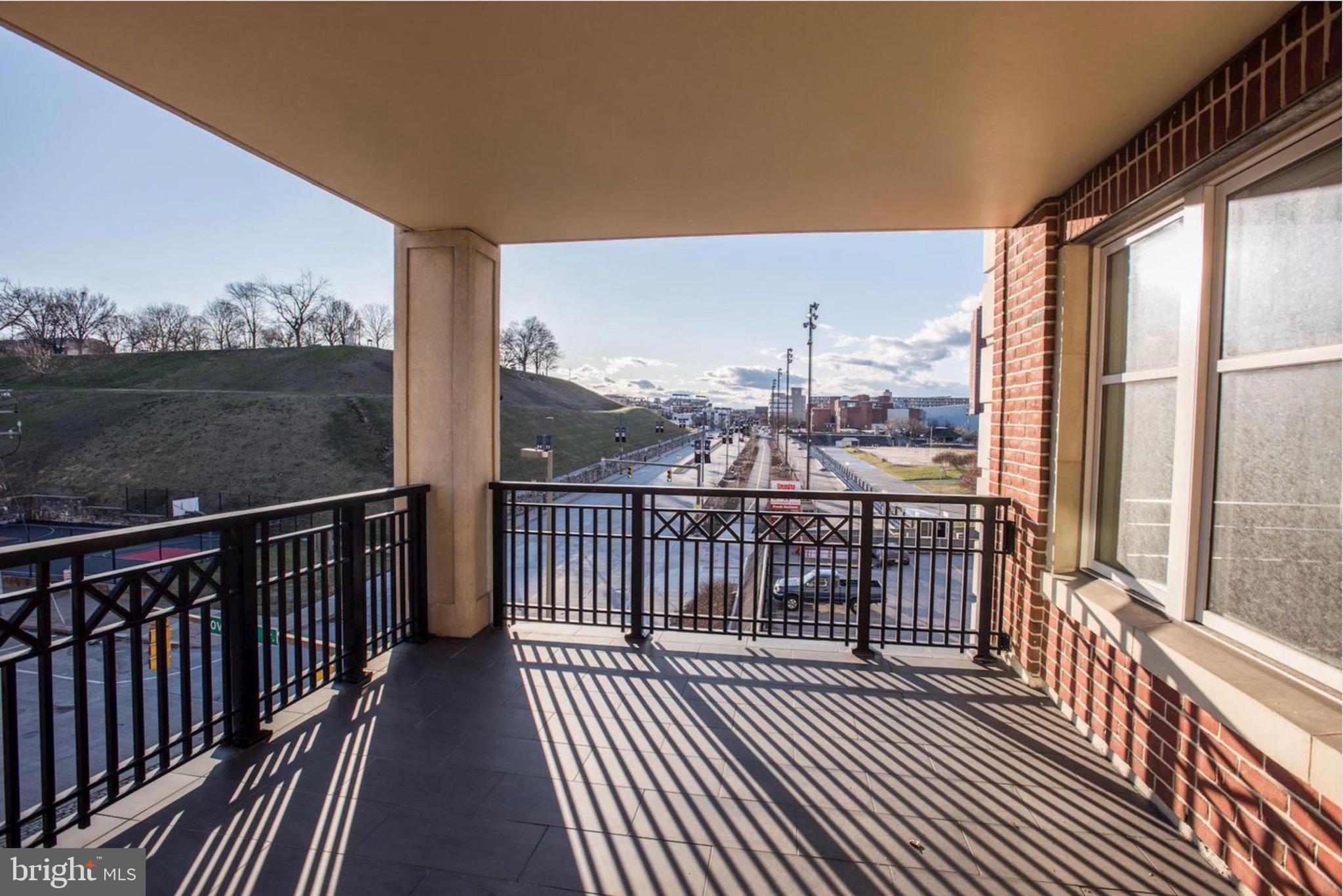 801 Key Highway, Unit 413 Baltimore, MD 21230 - Photo 37 of 40 a view of city from a balcony