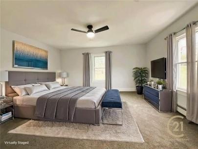 1218 Rodgers Street Pittsburgh, PA 15207 - Photo 6 of 15 a bedroom with a large bed and a flat screen tv