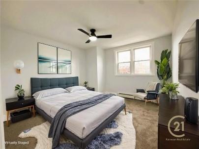 1218 Rodgers Street Pittsburgh, PA 15207 - Photo 8 of 15 a bedroom with a bed and a flat screen tv