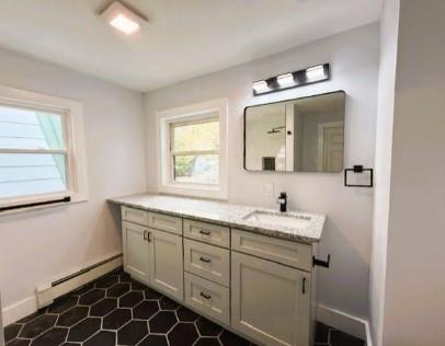 1218 Rodgers Street Pittsburgh, PA 15207 - Photo 10 of 15 a bathroom with a toilet sink and mirror