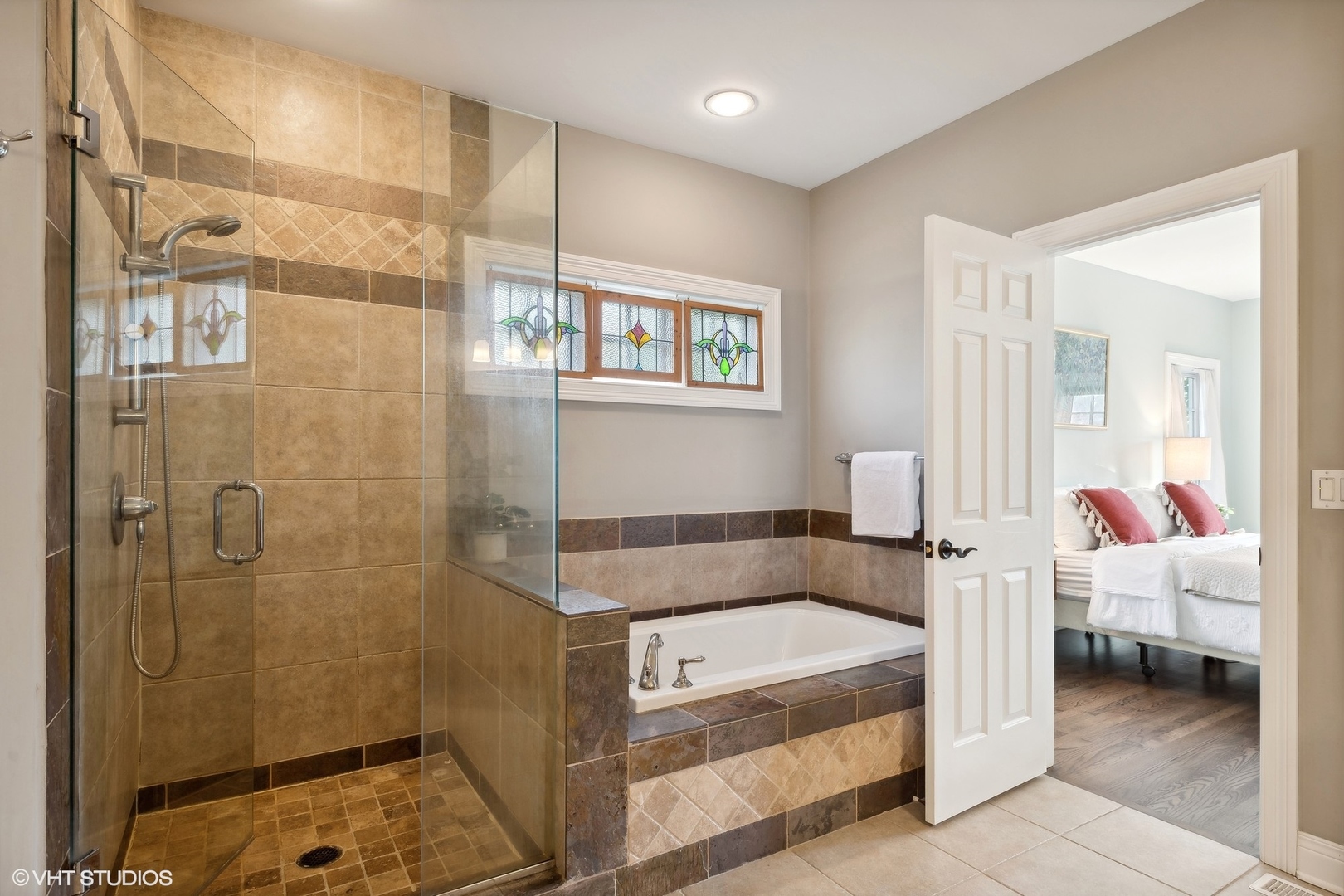 617 Hillside Road Glenview, IL 60025 - Photo 17 of 40 a bathroom with a tub and a shower