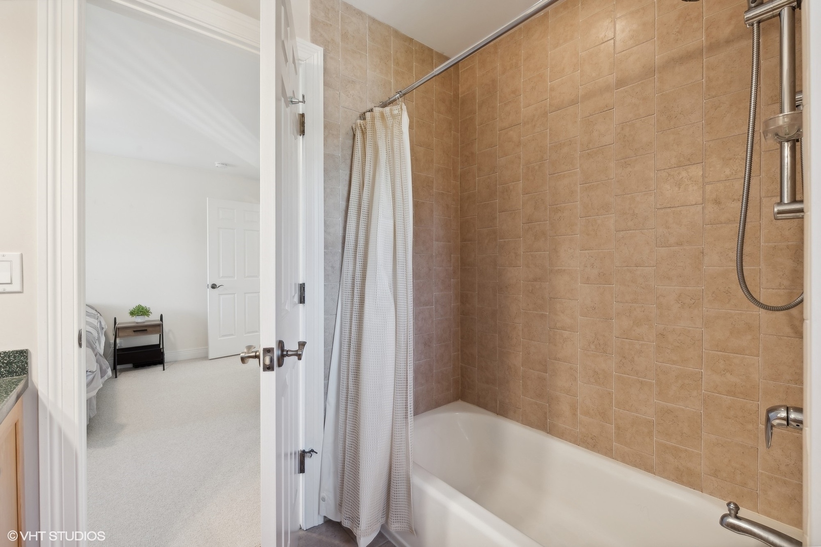 617 Hillside Road Glenview, IL 60025 - Photo 22 of 40 a bathroom with a bathtub and a shower
