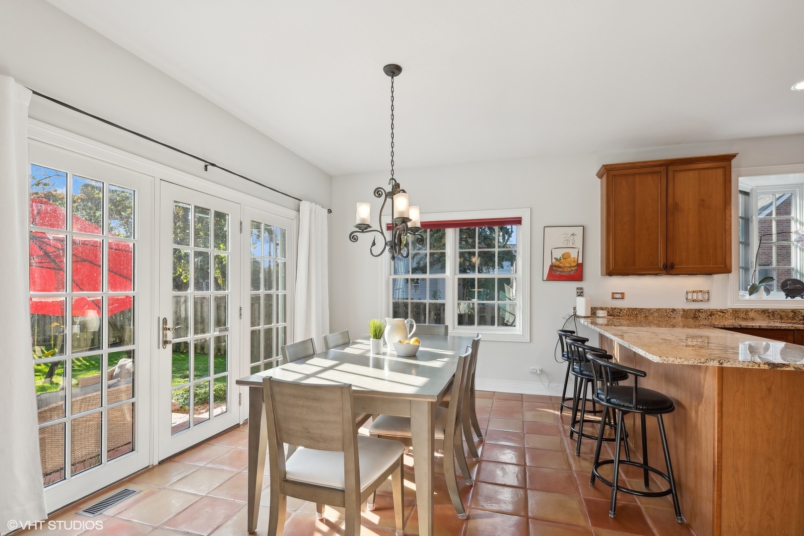 617 Hillside Road Glenview, IL 60025 - Photo 8 of 40 a view of a dining room with furniture window and outside view