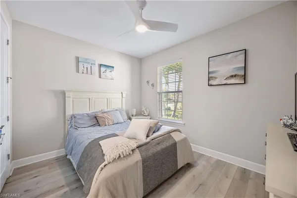 a room with a bed and a window