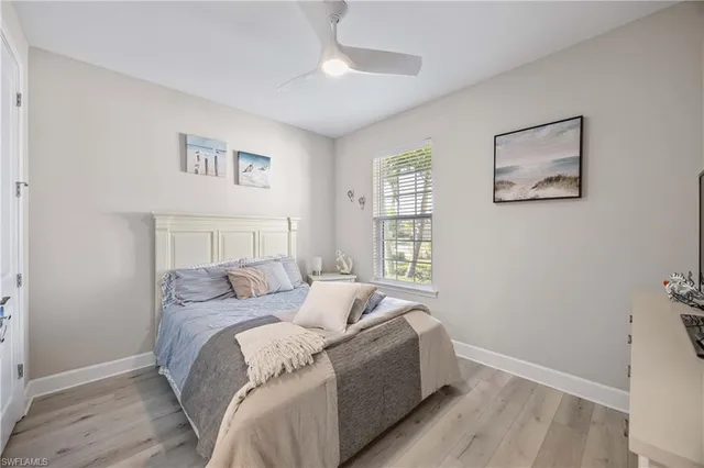 a room with a bed and a window