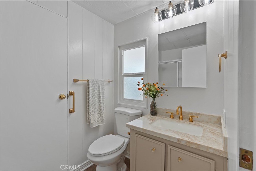 31130 South General Kearny Road, Unit 136 Temecula, CA 92591 - Photo 35 of 65 Bathroom 2 has new lighting, new quartz counters, new faucet, new toilet, new paint and flooring!