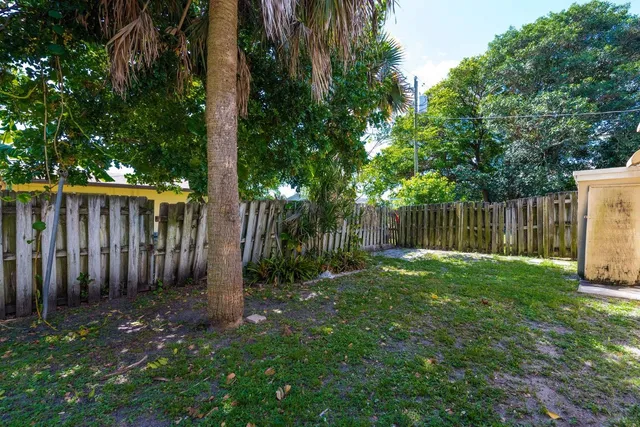 a view of backyard with green space