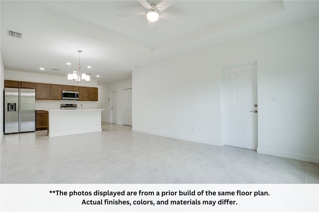 125 Admiral Circle Sebastian, FL 32958 - Photo 13 of 19 a view of a kitchen with a sink and a refrigerator