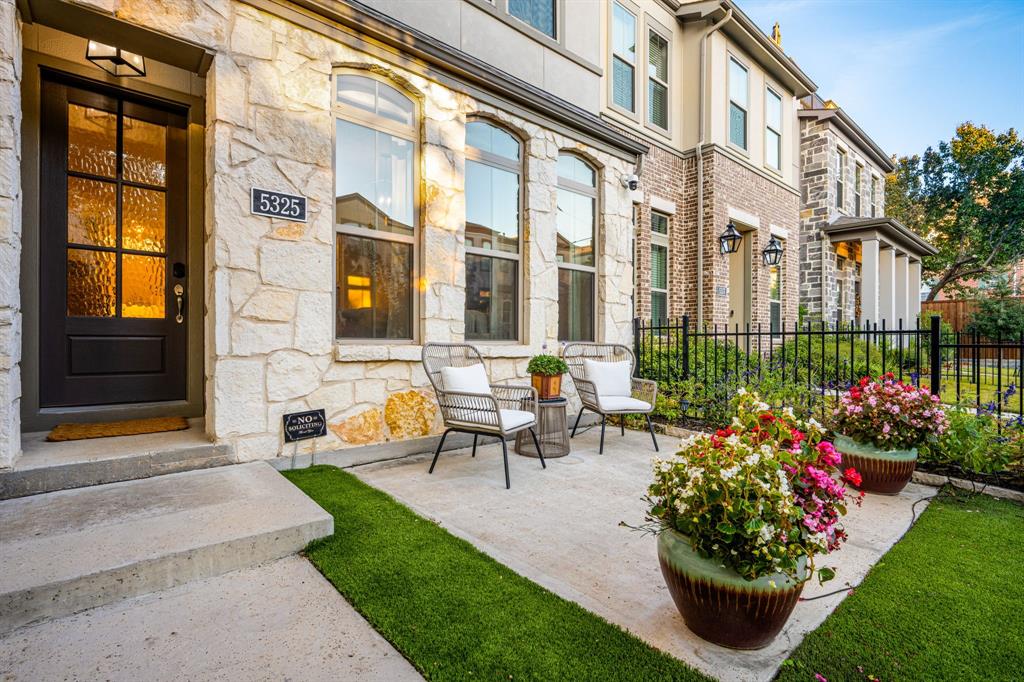 5325 Autumnbrook Court Dallas, TX 75209 - Photo 2 of 38 a view of a patio with couches table and chairs and potted plants