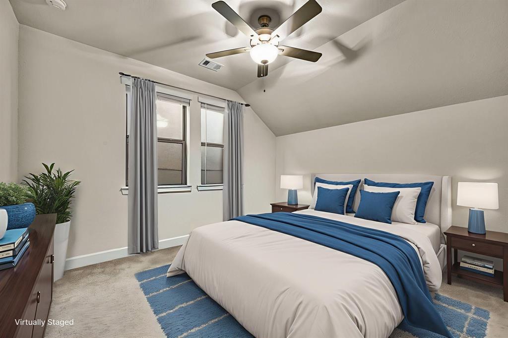 5325 Autumnbrook Court Dallas, TX 75209 - Photo 25 of 38 a bedroom with a large bed and a chandelier