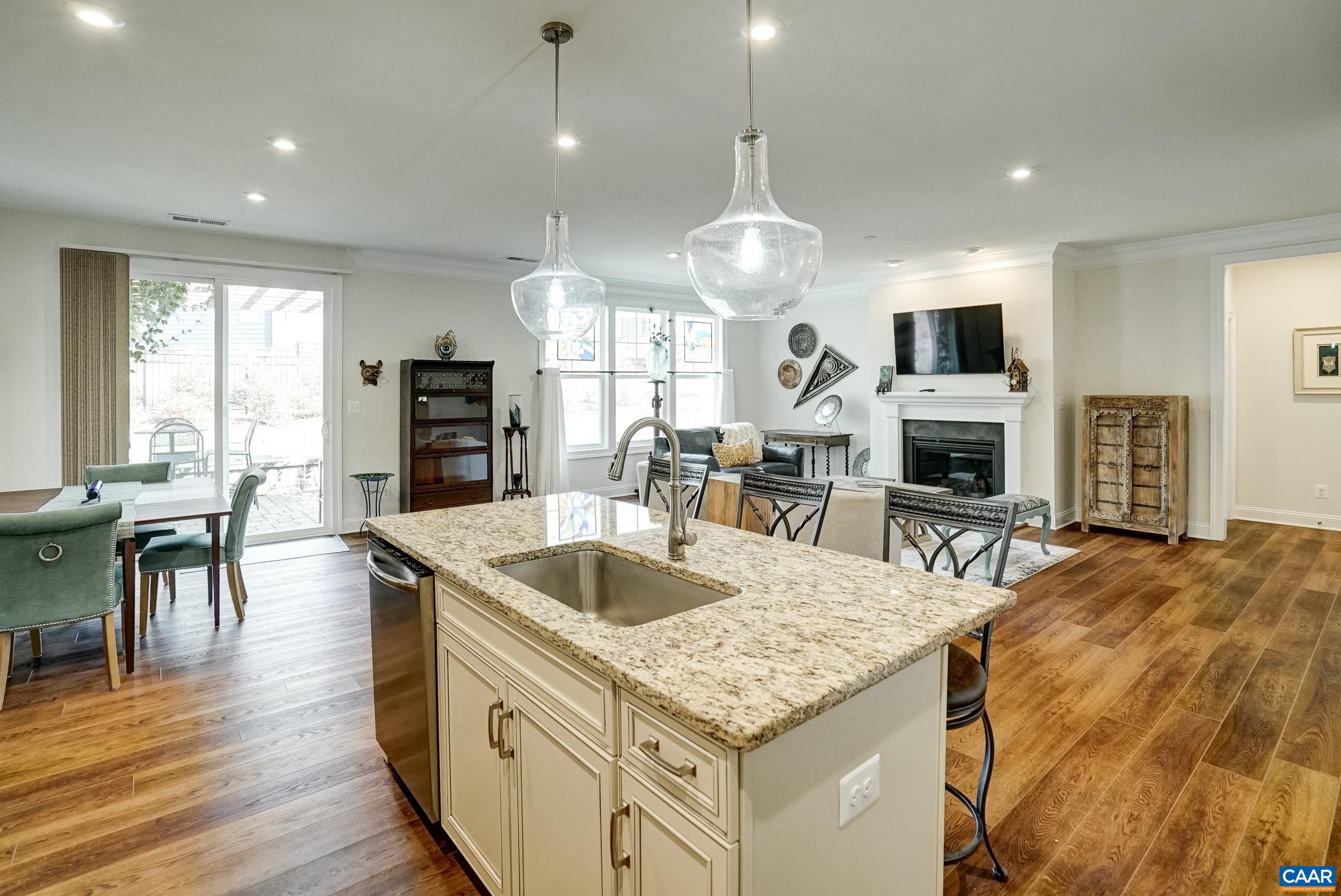 146 Timber Ridge Lane Zion Crossroads, VA 22942 - Photo 15 of 31 a kitchen with stainless steel appliances granite countertop a sink a stove and a wooden floors
