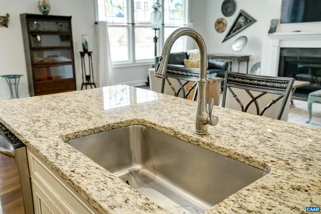 a kitchen with a table and chairs in it