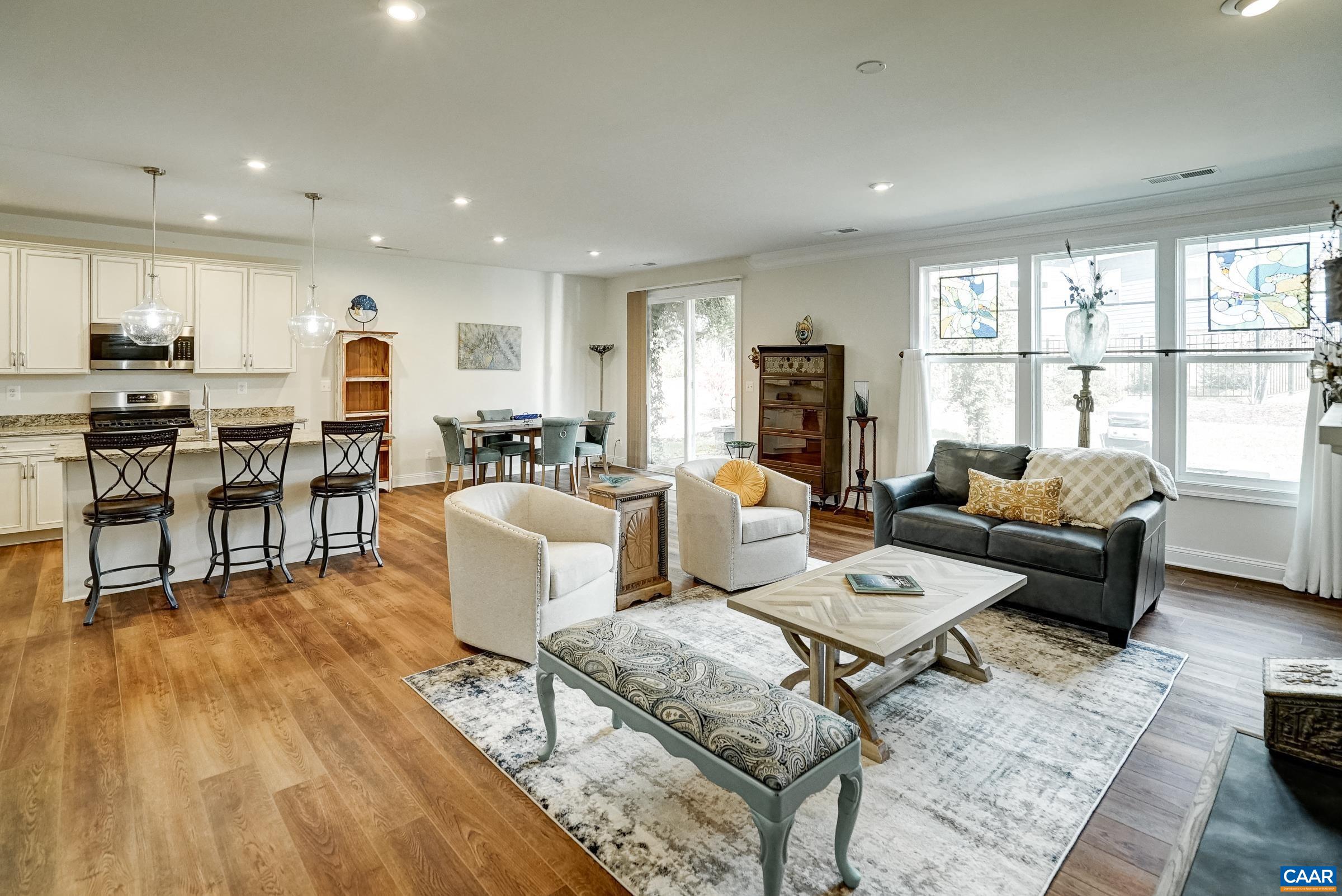 146 Timber Ridge Lane Zion Crossroads, VA 22942 - Photo 21 of 31 a living room with furniture wooden floor and a large window