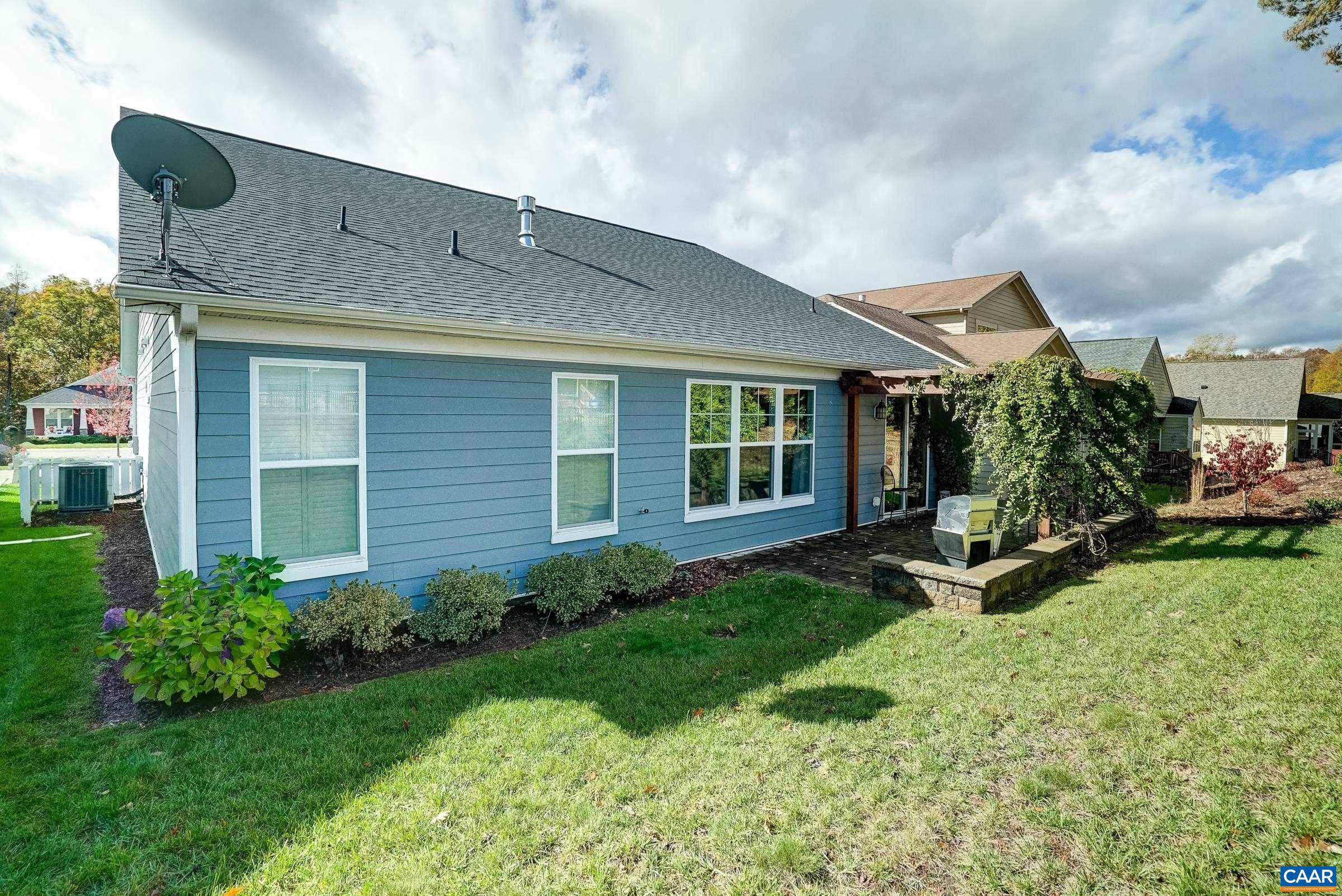 146 Timber Ridge Lane Zion Crossroads, VA 22942 - Photo 27 of 31 a view of a house with backyard sitting area and garden