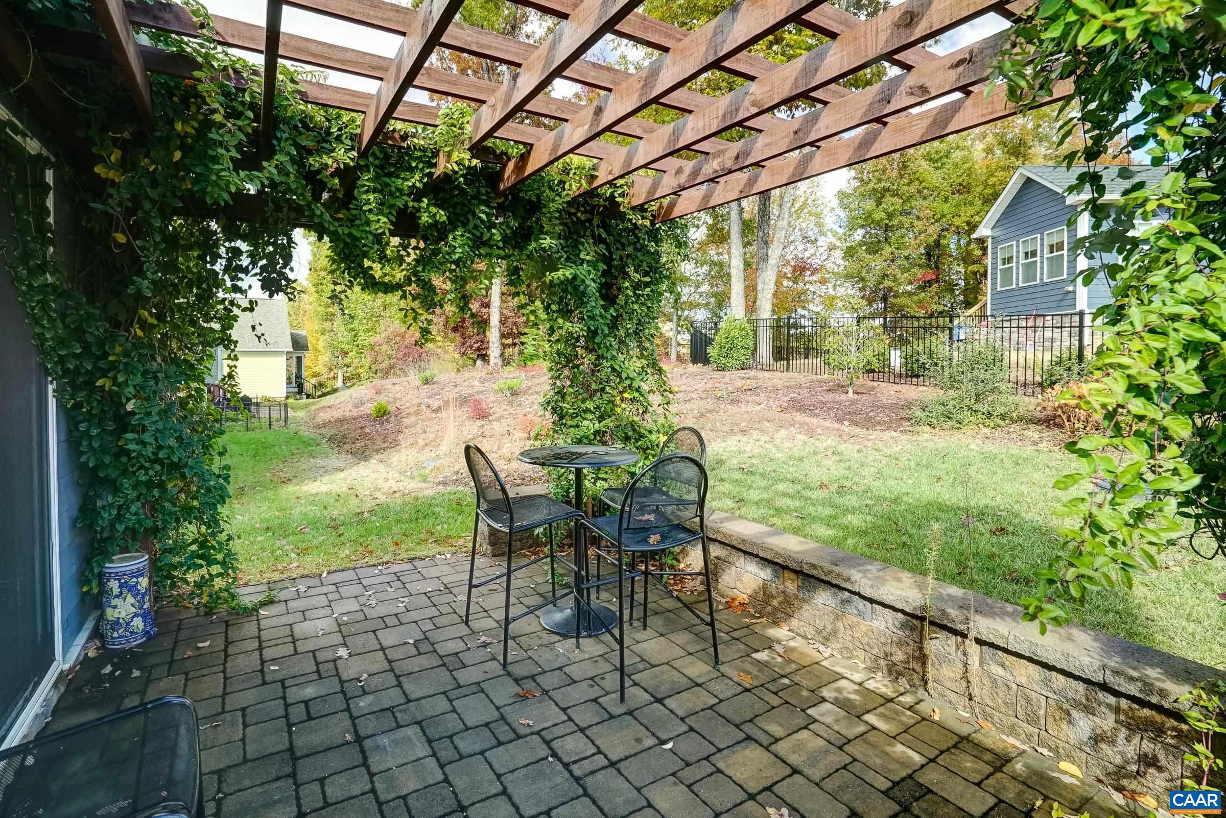 146 Timber Ridge Lane Zion Crossroads, VA 22942 - Photo 29 of 31 a view of a patio with table and chairs and potted plants