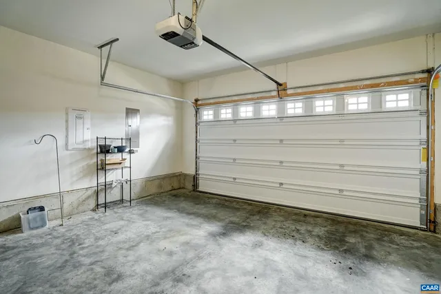 a view of a room with cabinet and mirrors