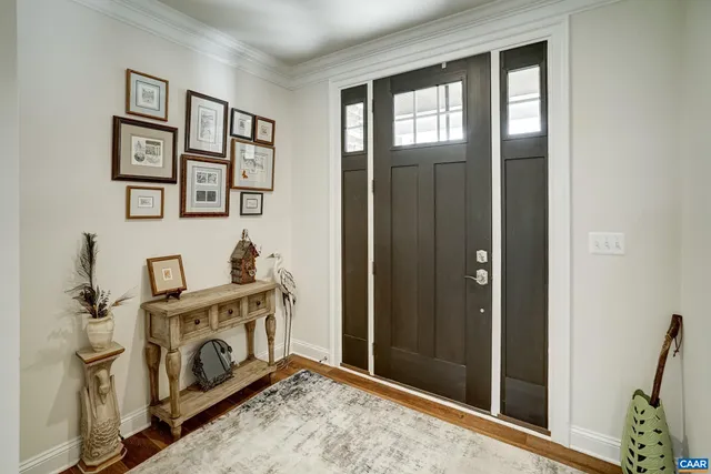 a view of an entryway with washer and dryer
