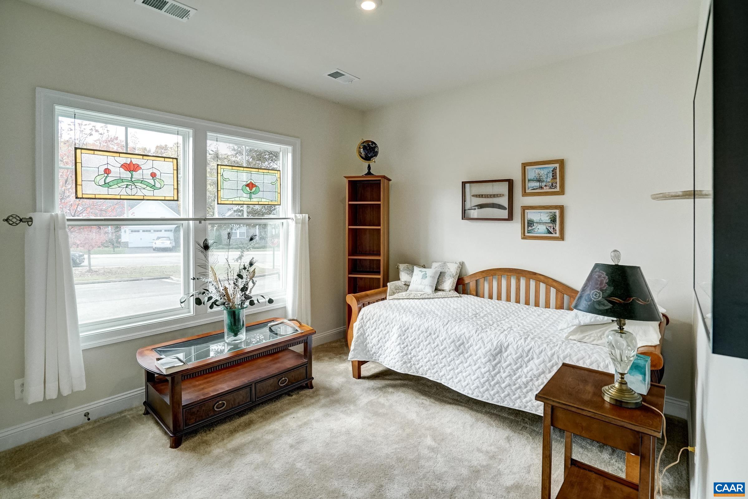 146 Timber Ridge Lane Zion Crossroads, VA 22942 - Photo 6 of 31 a bedroom with a bed and a window