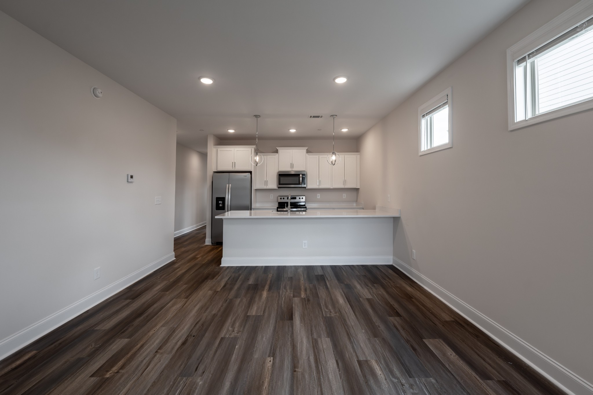 224 Franklin Street Pleasant View, TN 37146 - Photo 25 of 29 a view of a kitchen with a sink and wooden floor
