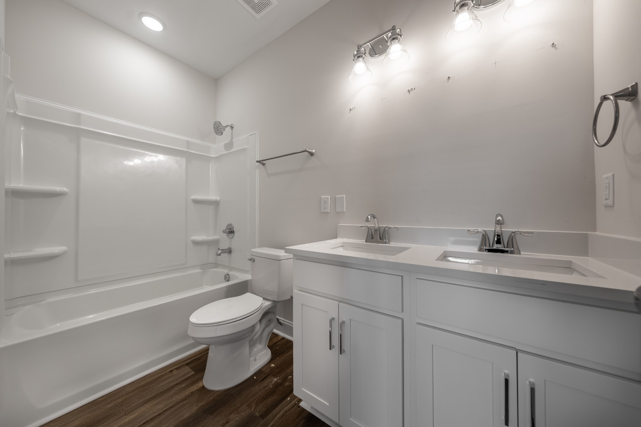 224 Franklin Street Pleasant View, TN 37146 - Photo 9 of 29 a bathroom with a double vanity sink toilet and shower