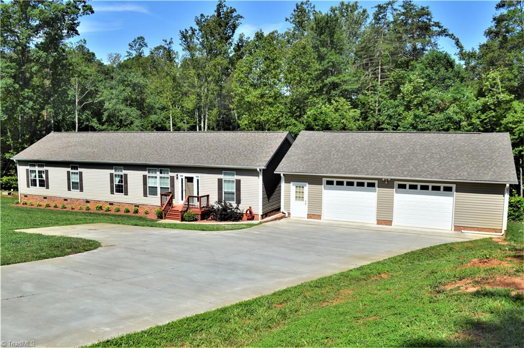 1387 Stewart Road Walnut Cove, NC 27052 - Photo 1 of 30 Exterior front view with concrete driveway