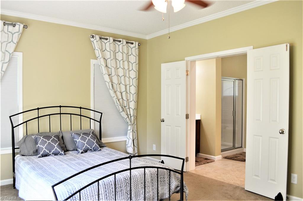 1387 Stewart Road Walnut Cove, NC 27052 - Photo 13 of 30 Master bedroom to master bath