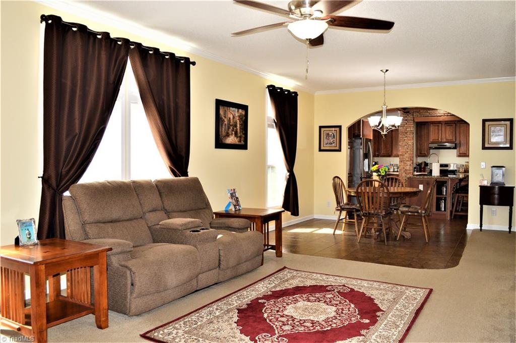 1387 Stewart Road Walnut Cove, NC 27052 - Photo 3 of 30 Living room is open to dining room