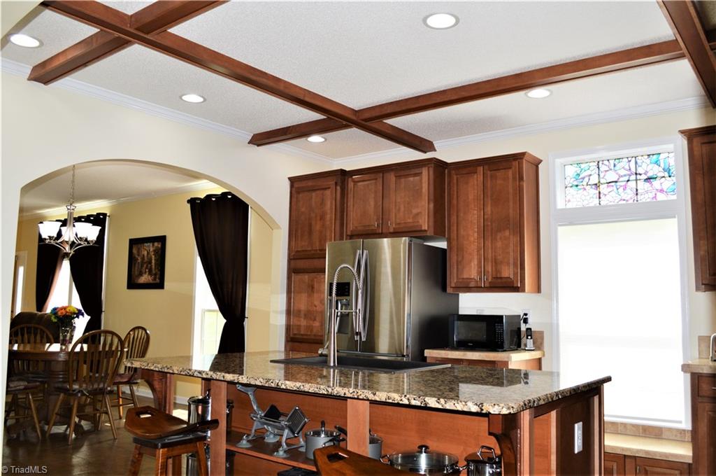 1387 Stewart Road Walnut Cove, NC 27052 - Photo 5 of 30 Kitchen has granite counter tops and recessed lighting