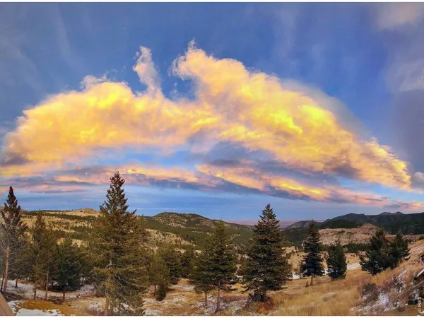 a view of lake and mountain