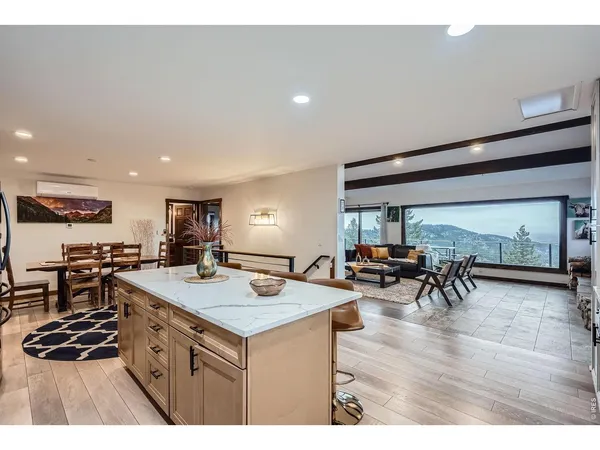 a kitchen with counter space and breakfast area
