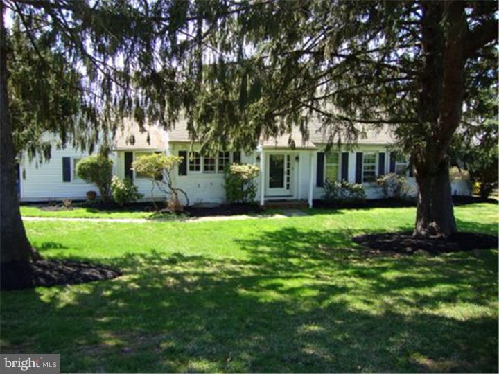 1314 Youngs Ford Road Gladwyne, PA 19035 - Photo 1 of 22 front view of house with a yard