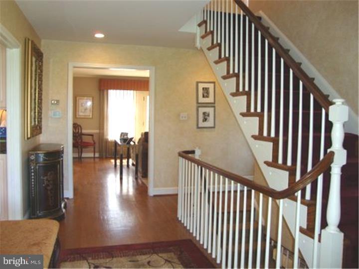 1314 Youngs Ford Road Gladwyne, PA 19035 - Photo 3 of 22 a view of entryway and hall with wooden floor