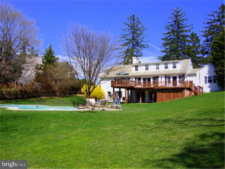 1314 Youngs Ford Road Gladwyne, PA 19035 - Photo 21 of 22 a view of a house with a big yard