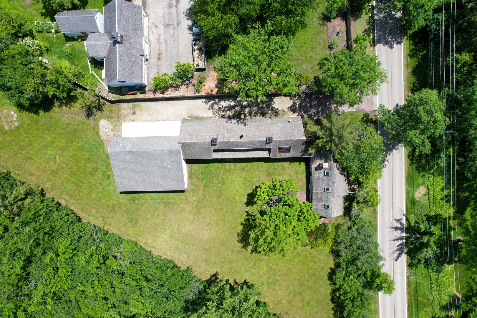 855 South Ridge Road Lake Forest, IL 60045 - Photo 19 of 22 an aerial view of a house with a garden and lake view
