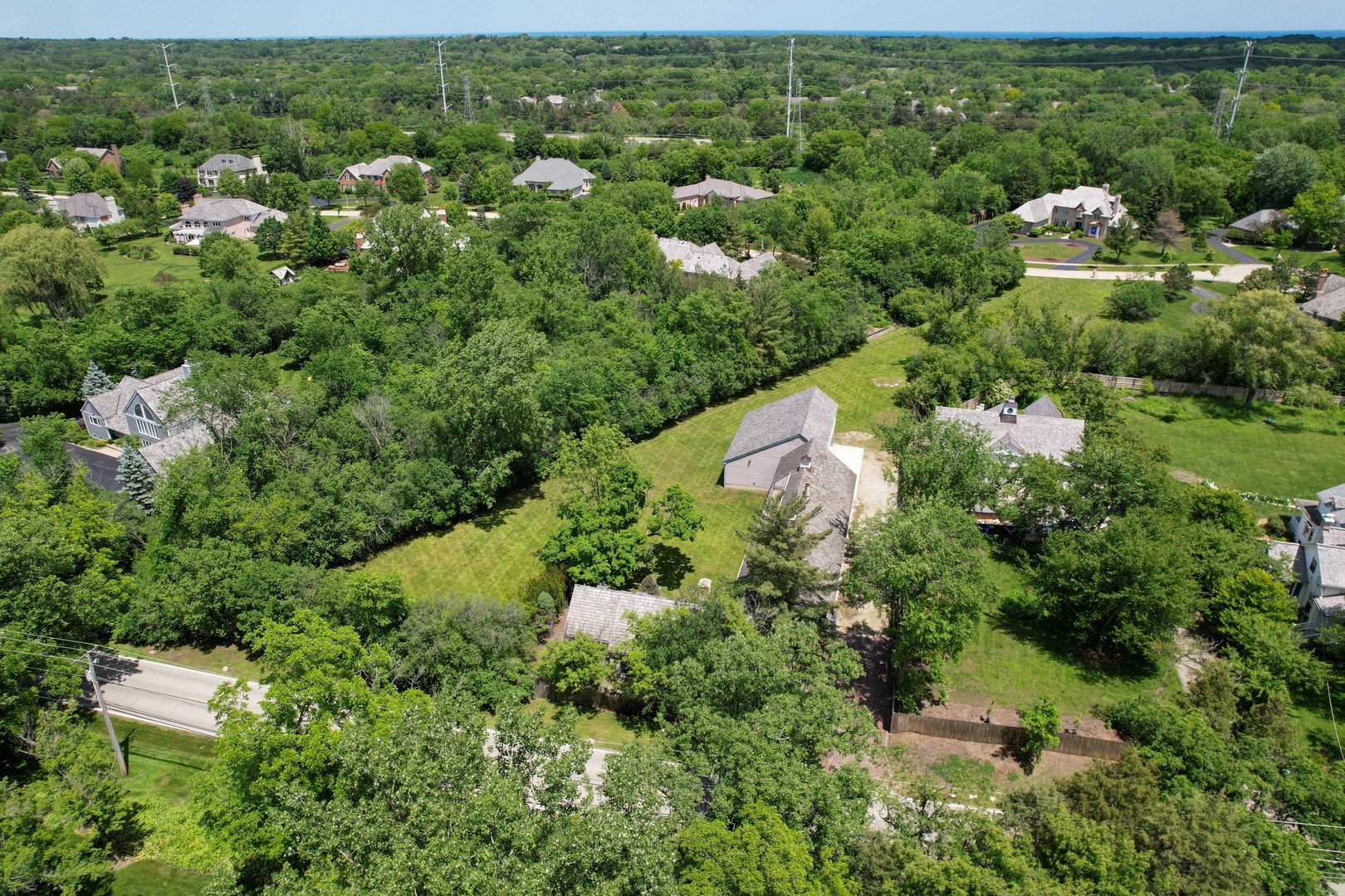 855 South Ridge Road Lake Forest, IL 60045 - Photo 20 of 22 an aerial view of residential house with outdoor space and trees all around