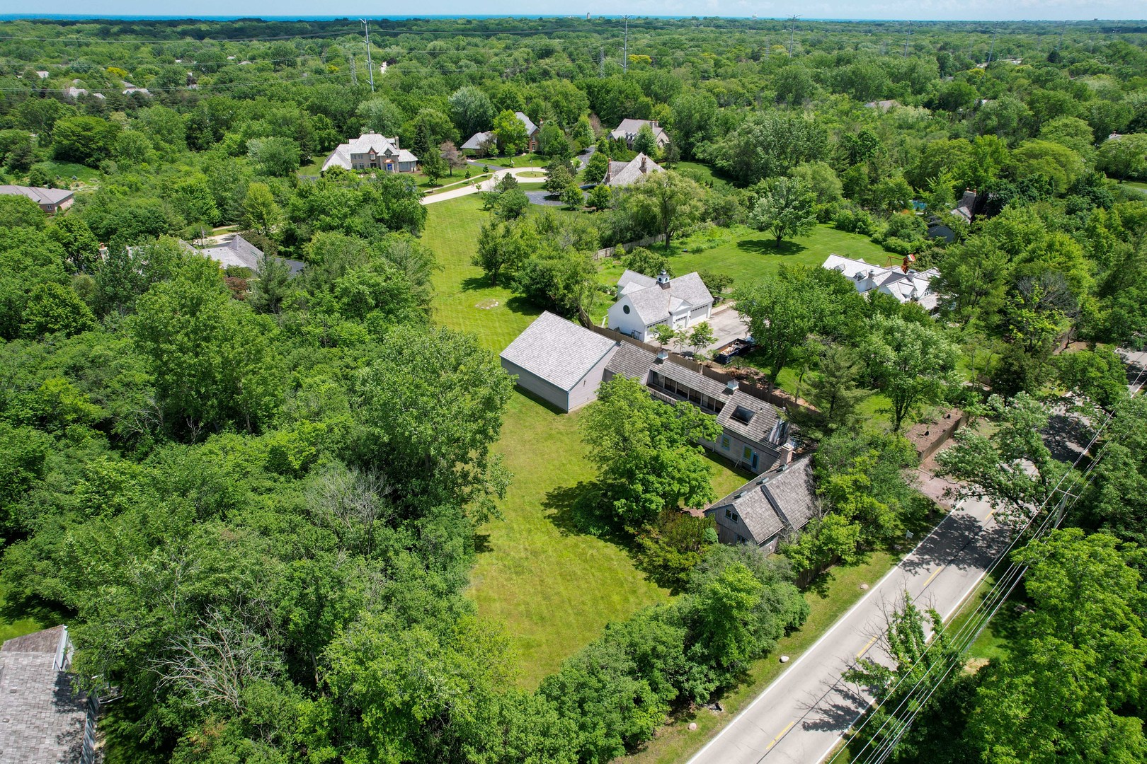 855 South Ridge Road Lake Forest, IL 60045 - Photo 21 of 22 an aerial view of a house with a yard