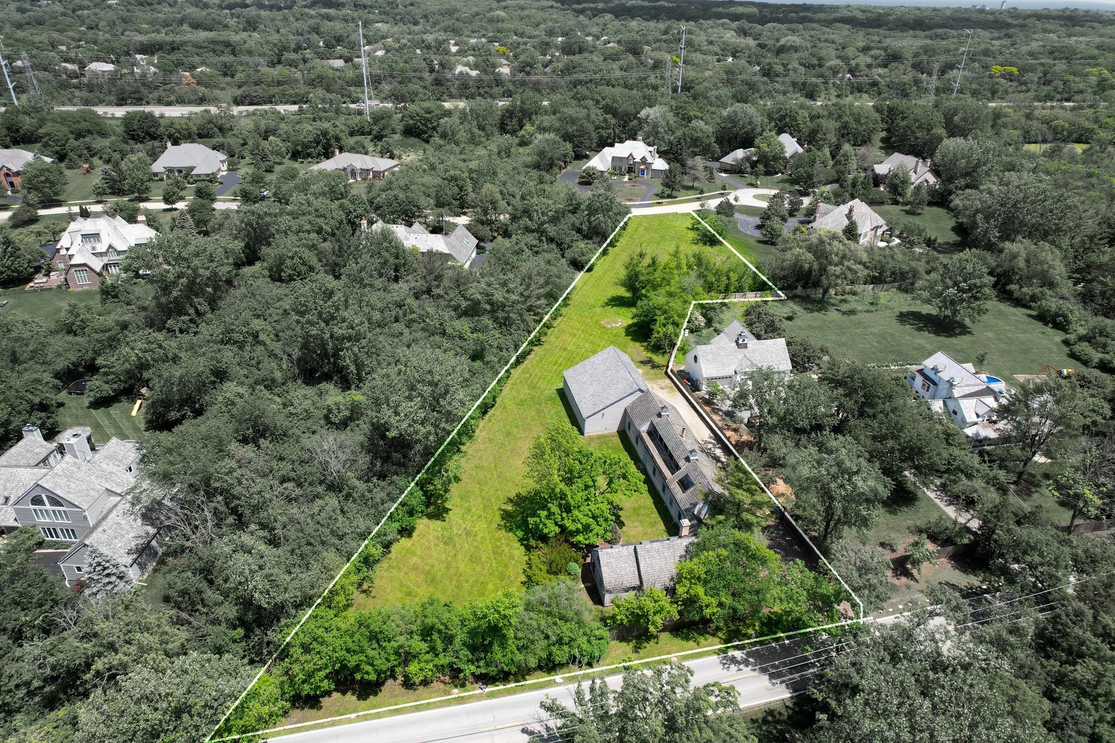 855 South Ridge Road Lake Forest, IL 60045 - Photo 22 of 22 an aerial view of a house with a yard