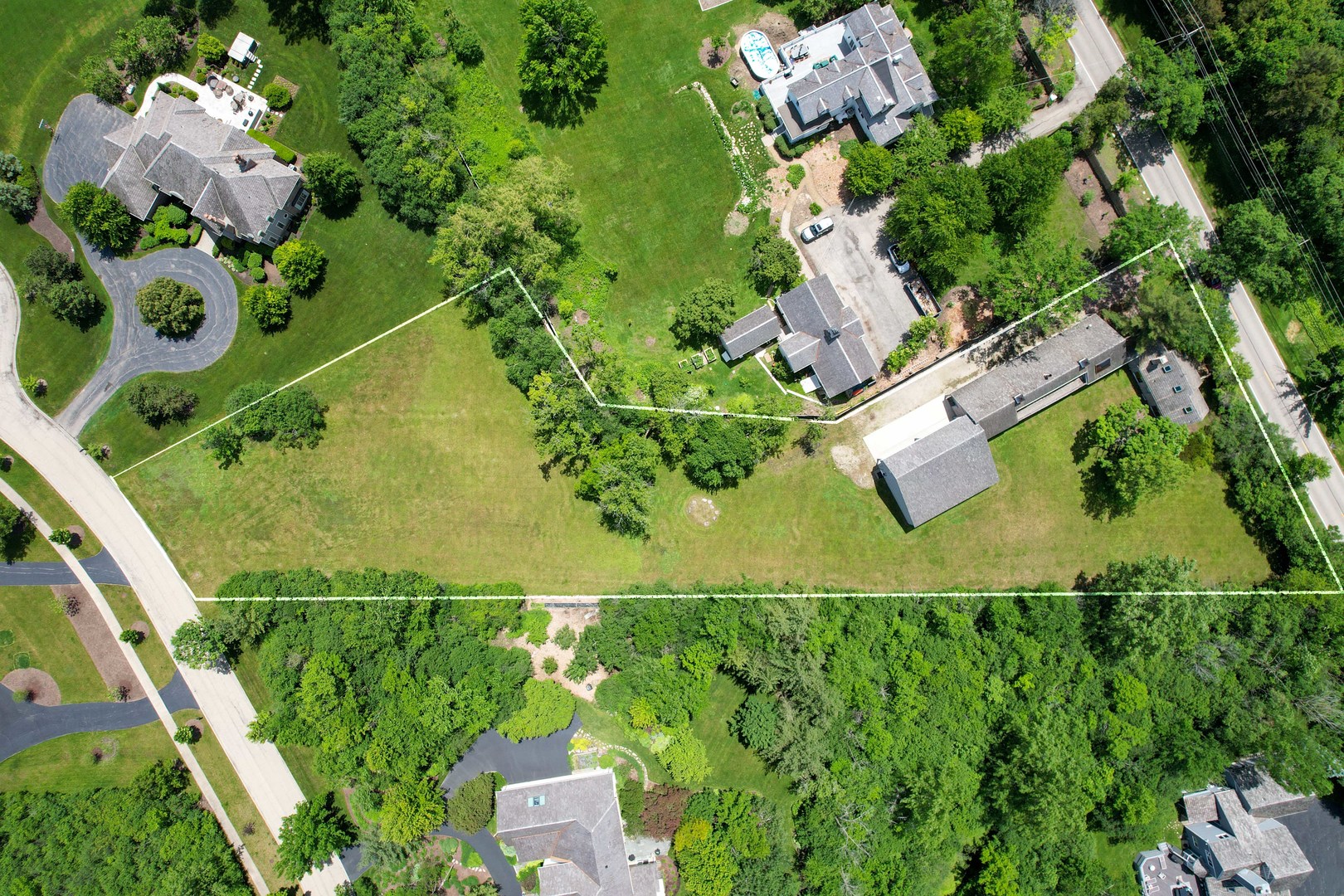 855 South Ridge Road Lake Forest, IL 60045 - Photo 3 of 22 an aerial view of a house with a yard