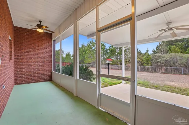 a view of a room with porch and a patio