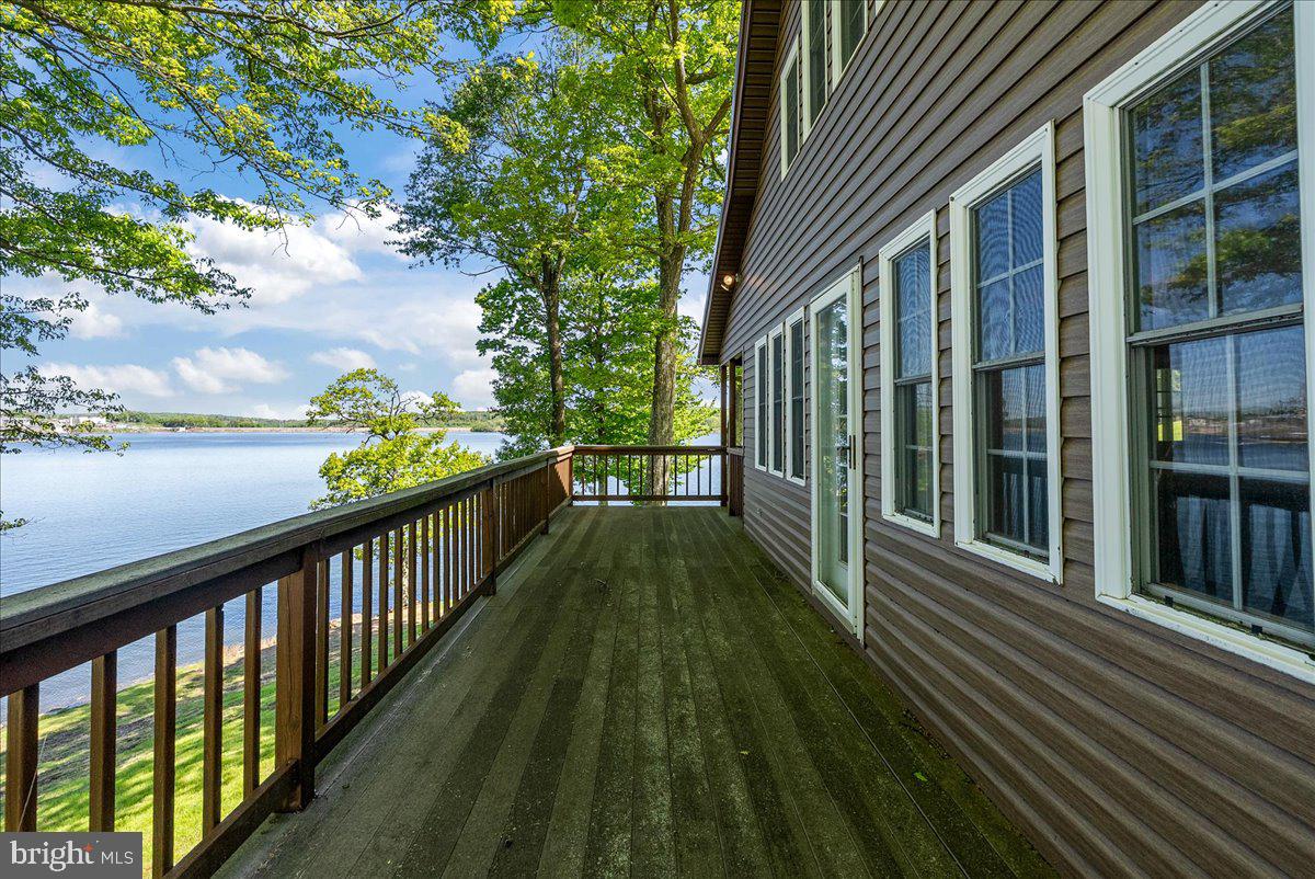 663 Bear Woods Road Mount Storm, WV 26739 - Photo 45 of 73 Serene lakeside retreat with lush views.
