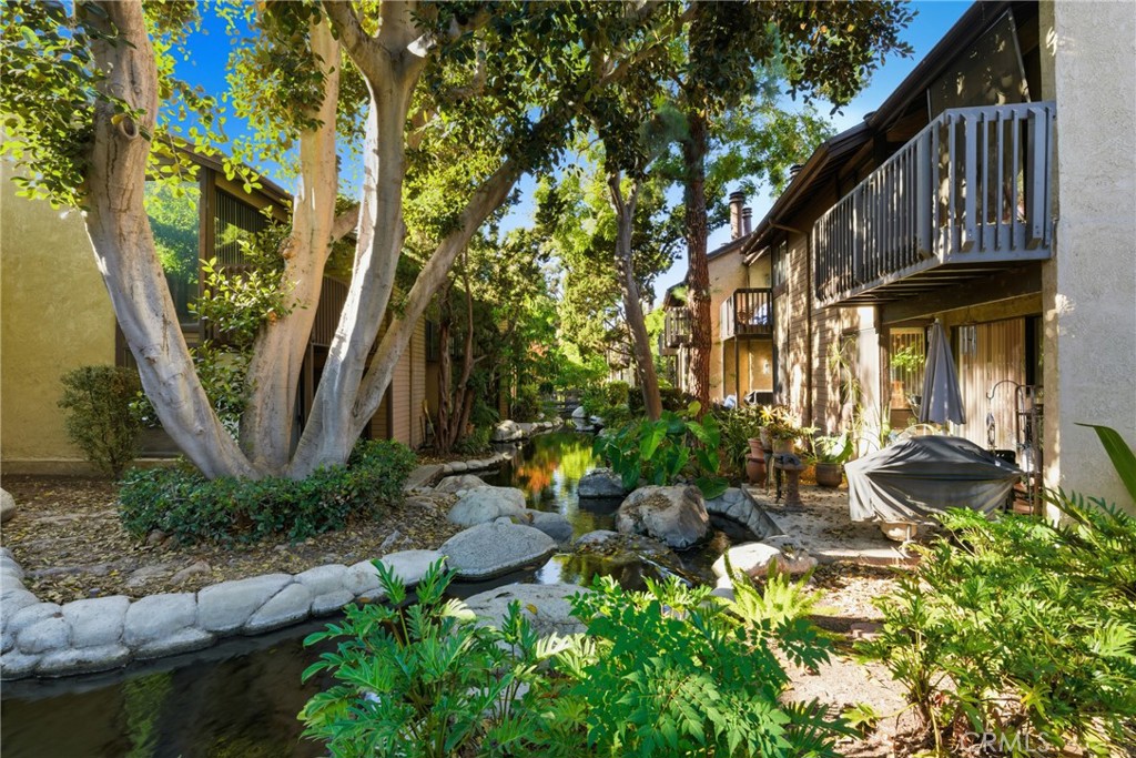 4140 Workman Mill Road, Unit 137 Whittier, CA 90601 - Photo 12 of 20 a view of backyard with outdoor seating and plants