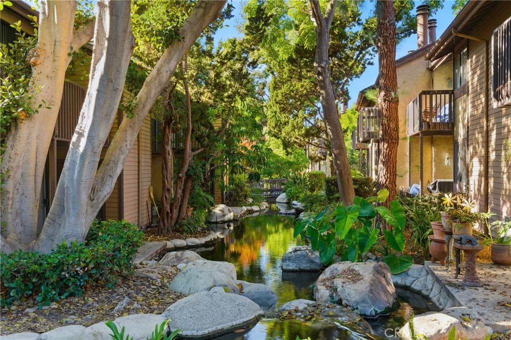 4140 Workman Mill Road, Unit 137 Whittier, CA 90601 - Photo 13 of 20 a view of backyard with swimming pool and outdoor seating