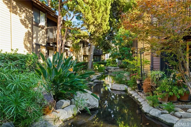 a view of a street with a building in the background